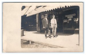 RPPC HARPER DRUG CO. Men Walking in Front  c1910s  Postcard