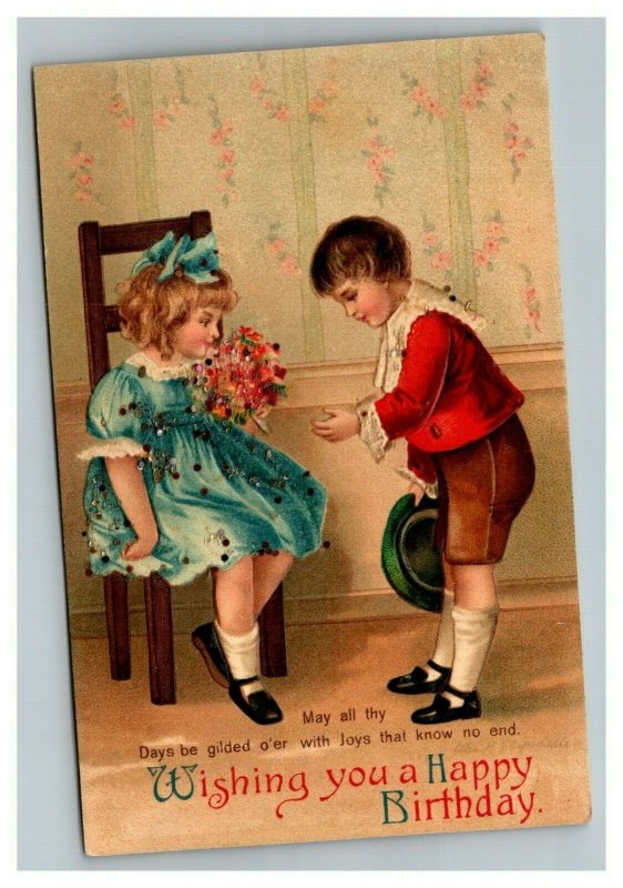 Vintage 1912 Ellen Clapsaddle Easter Postcard Boy Gives Girl Flowers Glitter 