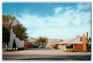 c1960's Idaho Motel Roadside Car Office Near Sate College Pocatello ID Postcard