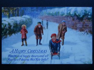 A HAPPY CHRISTMAS Children & Snow on Sledge c1913 Postcard Raphael Tuck C1771