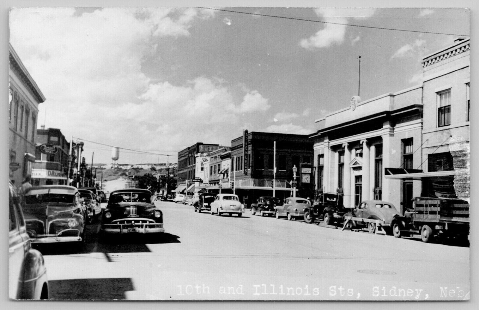 Sidney Nebraska10th & Illinois StreetsBank ClockMarketWater Tower1940s Cars United States