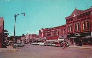 VINTAGE POSTCARD MAIN STREET AND BUSINESS DISTRICT FLORENCE COLORADO MID 1950's