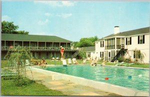 De Cocke And Kettle Motor Inn - pool scene - Seabrook New Hampshire postcard