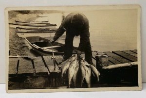 Clithera Minnesota Fishing Man w/ Nice Catch Row Boats on Pier RPPC Postcard D18