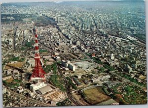 Postcard Japan Tokyo aerial view with Tower Japan Air Lines stamp