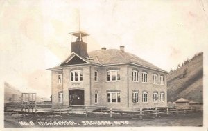 RPPC HIGH SCHOOL JACKSON WYOMING REAL PHOTO POSTCARD (c. 1920s)