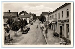 1952 Torsby Jarnvagsgatan Sweden Road Scene Businesses RPPC Photo Postcard