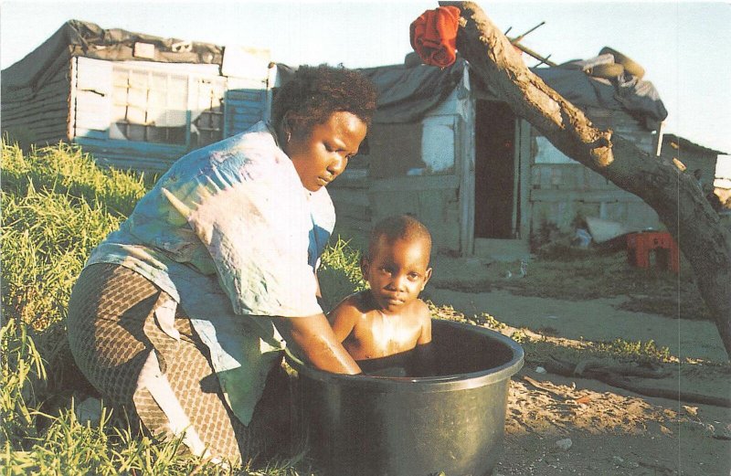 Lot156 woman children cape town south africa evening bath time