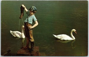 VINTAGE POSTCARD THE BOY WITH LEAKING BOOT AT CHOCOLATE TOWN U.S.A. (HERSHEY)