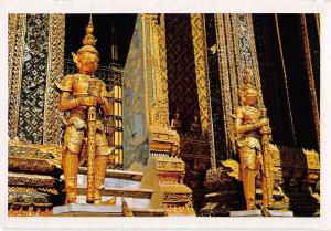 BR98978 two metal giants guarding wat phra keo  bangkok thailand