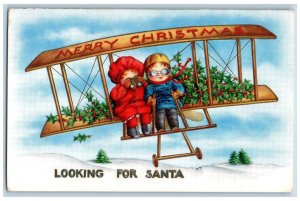 Christmas Postcard Children Airplane Looking For Santa Claus Berries Embossed