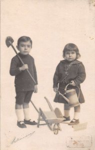 Children with Gardening Tools Shovel Watering Can Real Photo Postcard AA48783