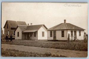 Bushnell South Dakota SD Postcard RPPC Photo Houses Scene Dirt Road c1910's