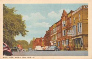 AMHERST NOVA SCOTIA CA~VICTORIA STREET-STOREFRONTS-AUTOS POSTCARD 1930s