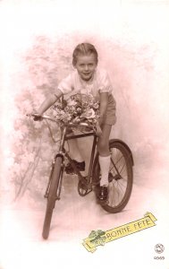 CUTE YOUNG BOY ON BICYCLE-BONNE FETE-1939 FRENCH HAPPY BIRTHDAY PHOTO POSTCARD