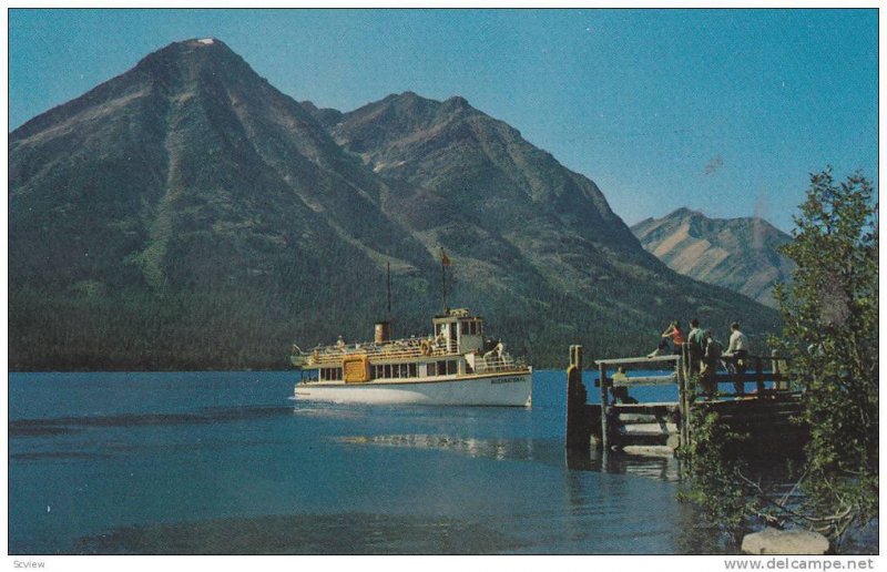 International, sightseeing launch at American end of beautiful waterton Lak...