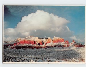 Postcard Cloud formations hover over the Red Rocks of Oak Creek Canyon, Arizona