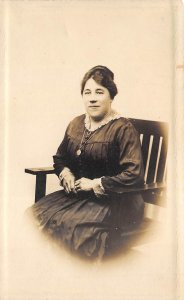 1910s RPPC Real Photo Postcar Woman Locket Seated Wooden Chair