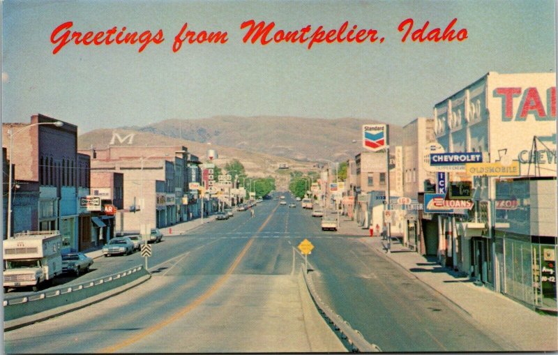 Vtg Montpelier Idaho ID Street View Chevrolet Oldsmobile Standard Gas Postcard