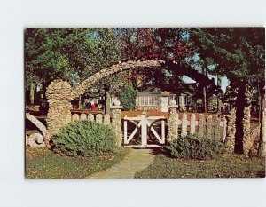 Postcard One of four entrances to Rockome, Greetings From Rockome, Arcola, IL