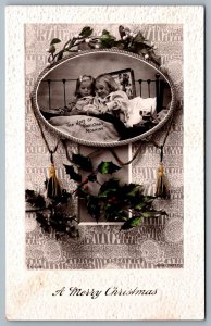 Postcard RPPC c1910s Merry Christmas Children Opening Presents Morning Art Deco