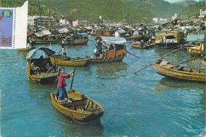 A fishing girl at Aberdeen Hong Kong 1971 postcard air mail Philippines stamp