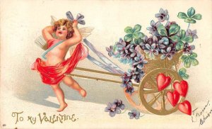 Valentines Greetings Cupid pulling Flower Cart Chariot Wagon Postcard AA31167