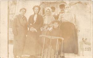 C35/ Interesting Real Photo RPPC Postcard c1910 Sled Riding Winter Family Dog