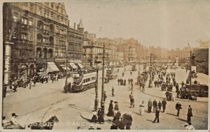 MANCHESTER ENGLAND~PICCADILLIY STOREFRONTS TROLLEY-REAL PHOTO POSTCARD