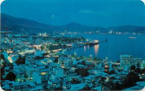 Panoramic night view of the Bay of Acapulco Guerrero Mexico
