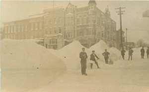 Postcard RPPC C-1910 Illinois Carlen Building men shoveling snow winter 23-12138