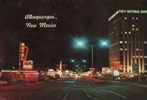 CONTINENTAL SIZE POSTCARD NIGHT SCENE AT EAST CENTRAL AVENUE ALBUQUERQUE N.M.