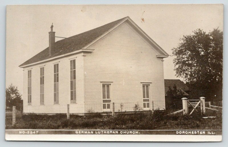 Dorchester IL~Simple Structure~German Lutheran Church~Fence Posts~RPPC 1911
