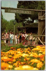 DISNEYLAND Anaheim California Postcard Frontierland Entrance Fort Tourists