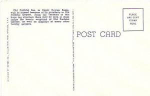 US unused 'golden oldie' Postcard, Old Faithful Inn and Geyser. approx 1925