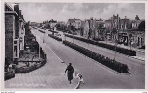 SANTPOORT (North Holland), Netherlands, 1910-1920s; Woman Walking Her Dog, Hagel