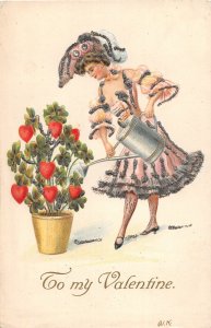 H79/ Interesting Postcard Watering Can Garden c1910 Comic Girl 154