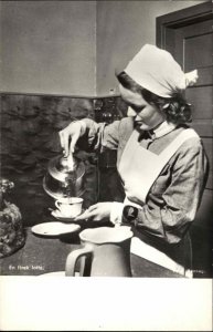 Finland or Sweden Woman Maid Serving Tea Teapot Real Photo Postcard