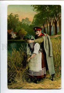 3076423 WWI Russian soldier w/ rural girl in native Vintage PC