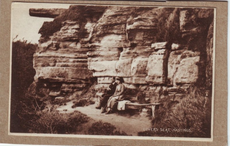 P1333 old postcard unused lovers seat couples hasting england