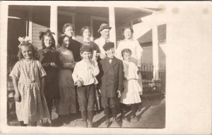 RPPC Sweet Family Photo Girls Bows Boy Eating Apple Nice Smiles Postcard Z20