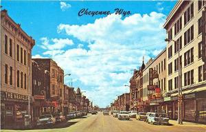 Cheyenne WY Street View Storefronts Old Cars Postcard