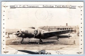 1943 RPPC C-40 TRANSPORT PLANE SELFRIDGE FIELD MICHIGAN FANCY BORDER POSTCARD 