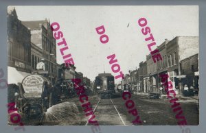 Ames IOWA RPPC c1910 MAIN STREET Stores TROLLEY Streetcar WATER WAGON Neat IA