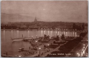 Geneve La Nuit Switzerland Panorama Pier by Night Real Photo RPPC Postcard