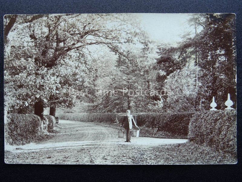 England unknown Location GENT CARRIES TWO PAILS of MILK or WATER Old RP Postcard