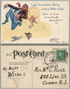 I GET BOOSTED ALONG EVERY LITTLE WHILE 1907 ANTIQUE COMIC POSTCARD