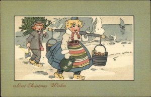 Christmas - Little Dutch? Girl Bucket of Fruit & Jug c1905 Postcard