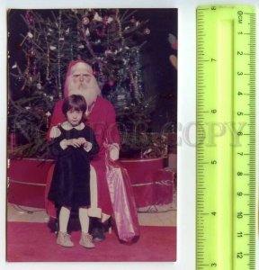 484435 USSR 1986 Santa Claus girl at Christmas tree Christmas New photo