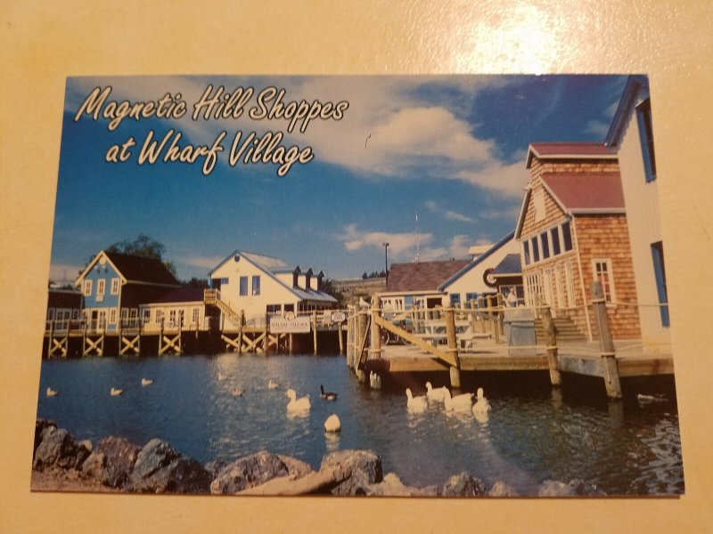 Magnetic Hill Shoppes at Wharf Village, New Brunswick Canada Postcard